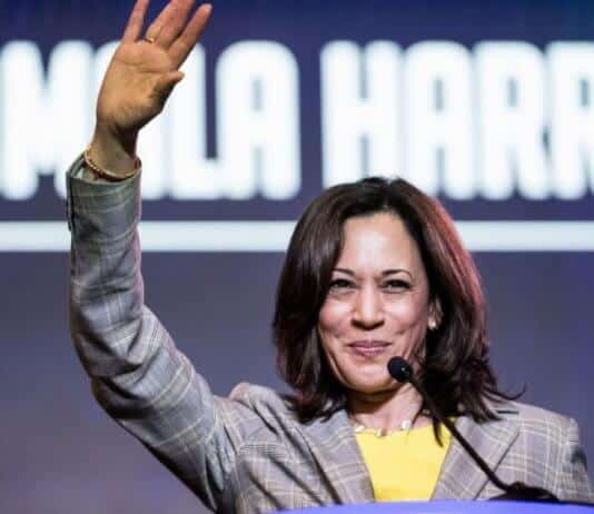 Kamala Harris Biography – Net Worth, Education, Husband, Kids Kamala Harris With Hands Up